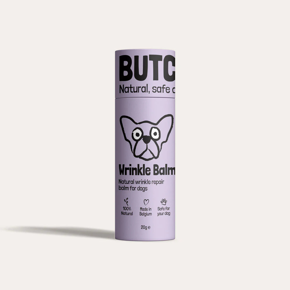 Purple cylindrical container of Butch Wrinkle Balm for dogs on a light purple background