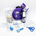 Pet first aid kit with various components on a white background