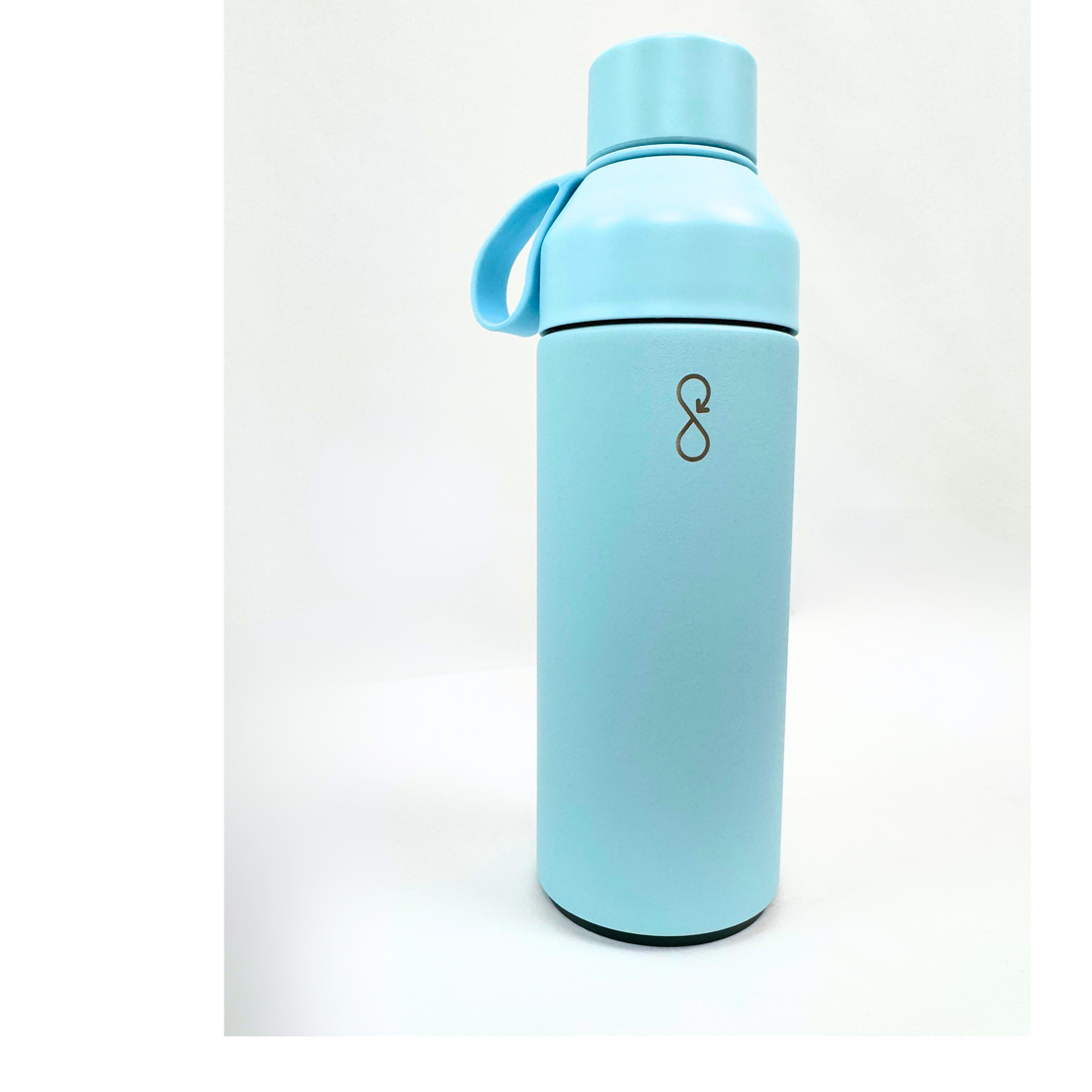 Light blue water bottle with a handle on a white background