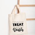 Beige tote bag with 'Treat Treat Like a Dealer' text and paw print design on a white background.