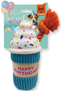 A Fofos brand dog plush toy shaped like a cupcake, featuring a blue ribbed base, a tan paper band with pink 'Happy Birthday' text, a white plush frosting top with colorful confetti, and an orange rope toy attached. The product is shown against its original retail backing card, which features a dog wearing a party hat and a Fofos logo.